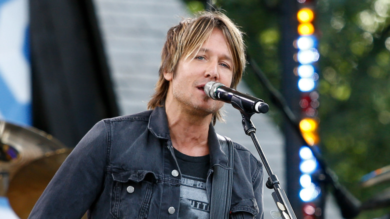 Keith Urban perfomring onstage