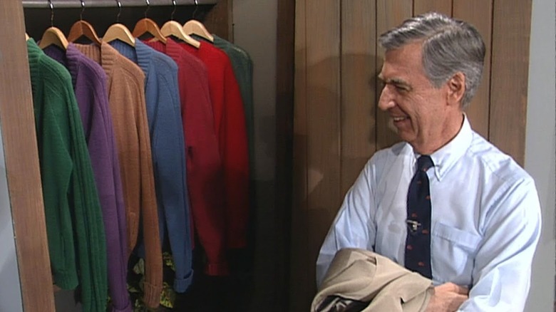 Fred Rogers showing off his sweaters on Entertainment Tonight