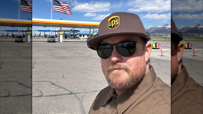 Brandon Sheets taking a selfie at a gas station