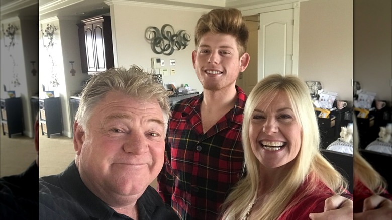 Dan, Laura, and Garrett Dotson smiling