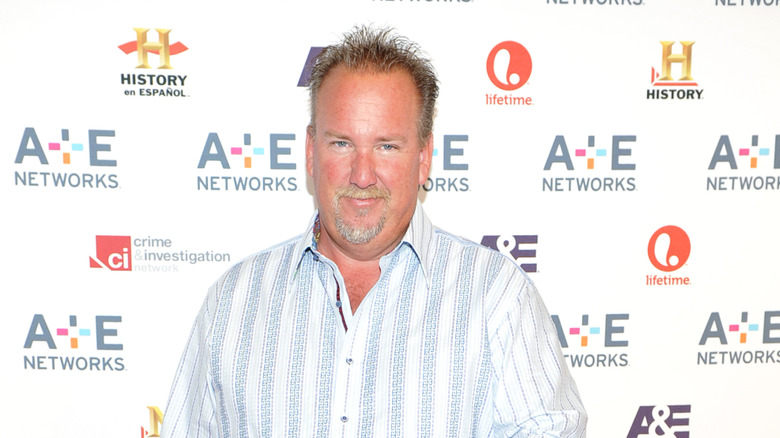 Darrell Sheets smiling at A&E Upfronts at Lincoln Center in 2012