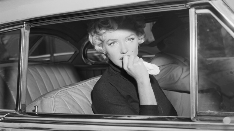 Marilyn Monroe in a car