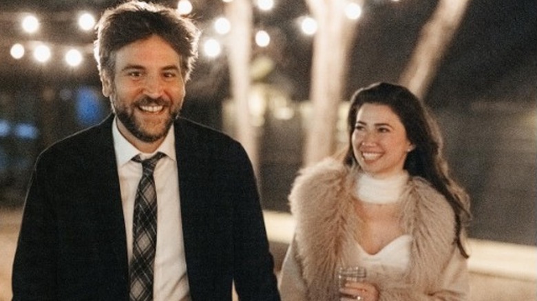 Josh Radnor smiling with Jordana Jacobs