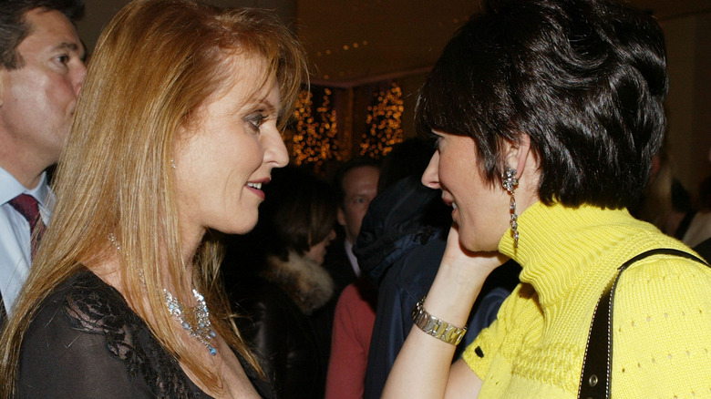 Sarah Ferguson chatting with Ghislaine Maxwell in 2003
