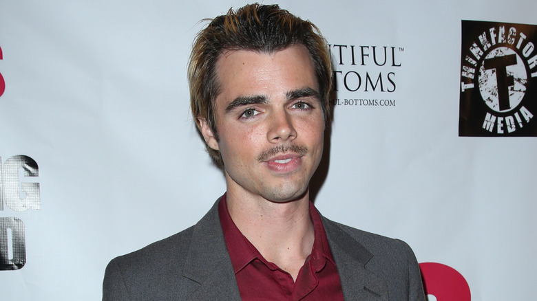Reid Ewing attending a red carpet event in 2014