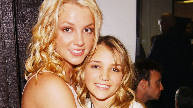 Britney and Jamie Lynn Spears smiling and embracing