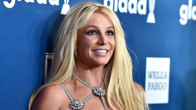 Britney Spears smiling and posing for photos