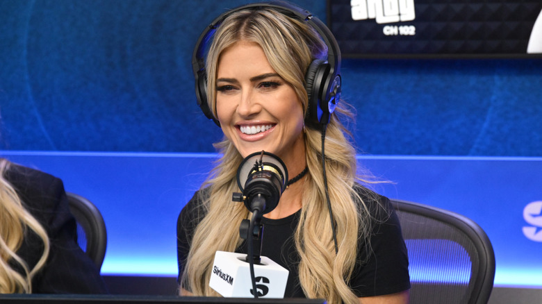 Christina Haack smiling during a podcast appearance