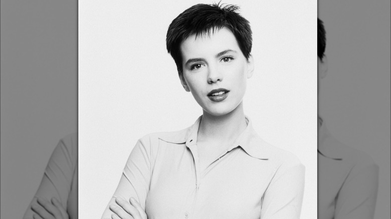 Kate Beckinsale posing for a photo circa 1996