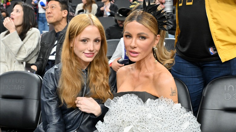Lily Mo Sheen and Kate Beckinsale attending a basketball game