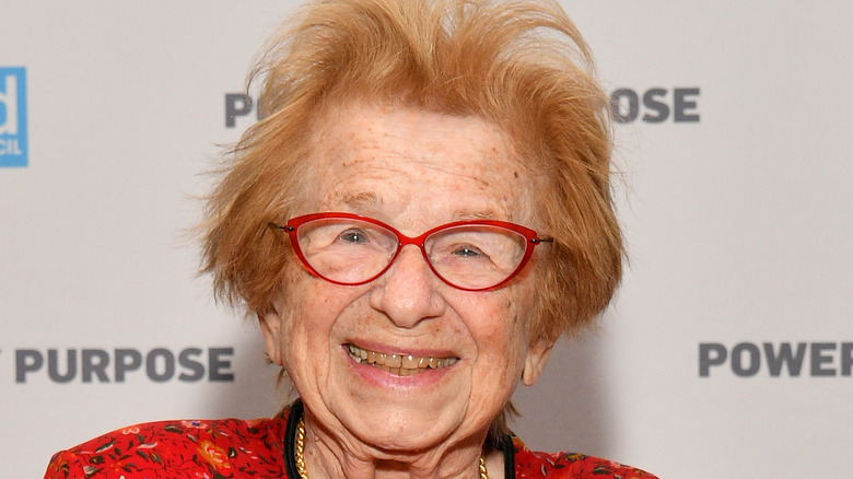 Dr. Ruth smiling with glasses