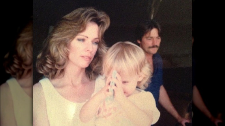 Young Amber Heard with her mother 
