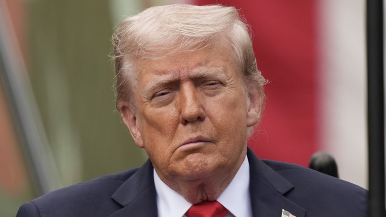 Donald Trump's face drooping at a 9/11 memorial in 2025