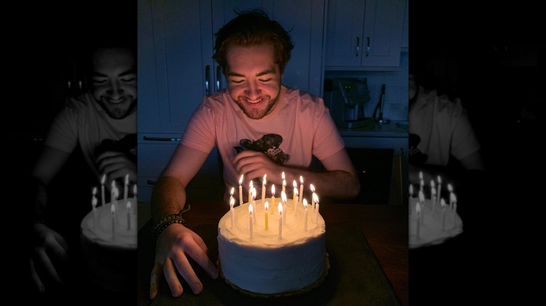 Michael Gandolfini smiling at his birthday cake in 2020