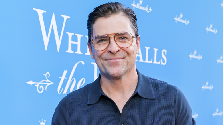 Kavan Smith smiling at a Hallmark event.