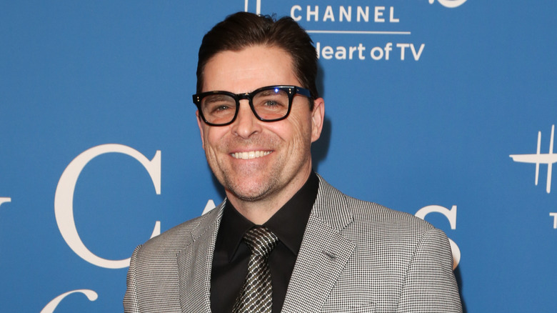 Kavan Smith smiling at a Hallmark event.