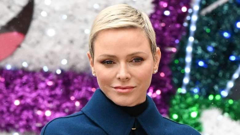 Princess Charlene staring into space in December 2022