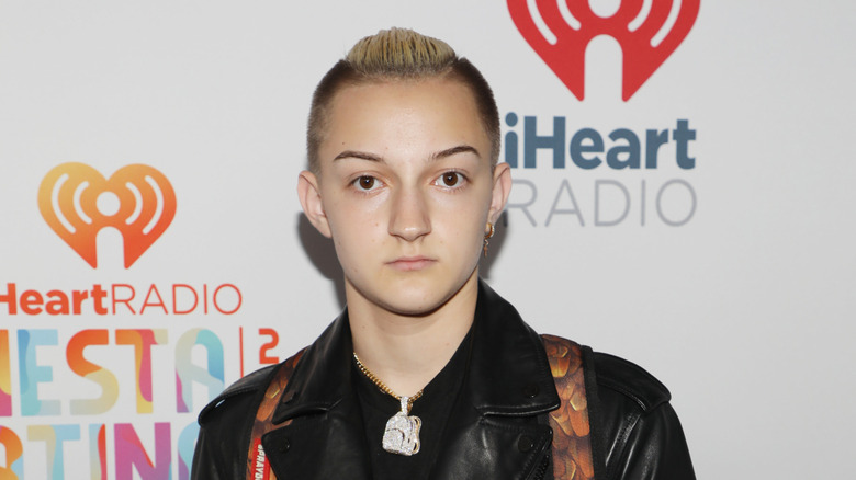 Russell Horning posing at an iHeart Radio event in 2018