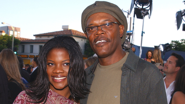 Samuel L. Jackson and his daughter Zoe smile at an event outside