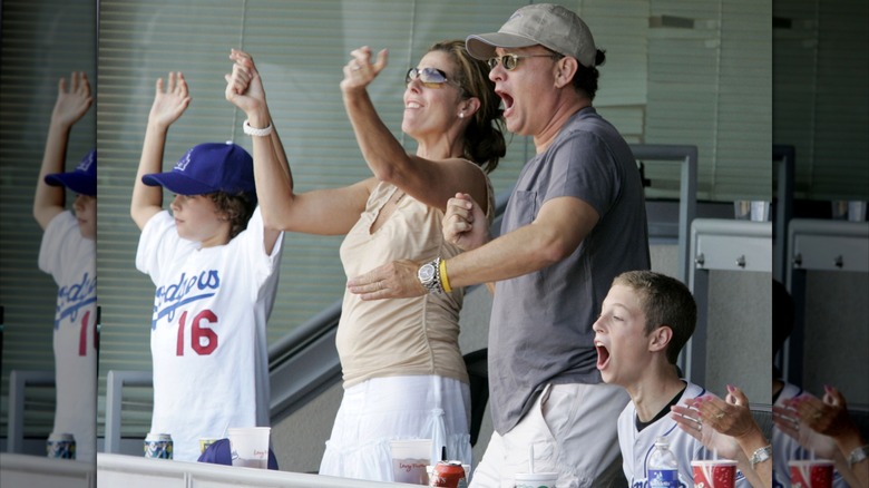 Tom Hanks and Rita Wilson with sons Truman and Chet attending a Los Angeles Dodgers game