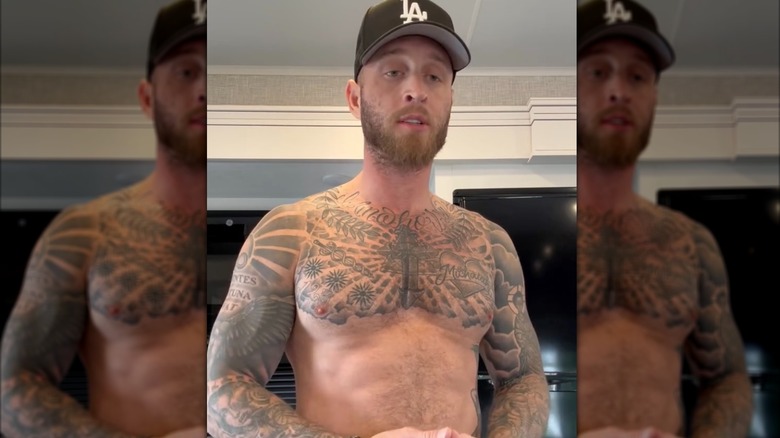 Chet Hanks without a shirt, showing off his muscular frame