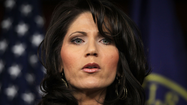 Kristi Noem speaking at an event in 2012