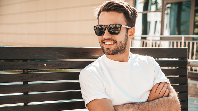 man smiling in sunglasses