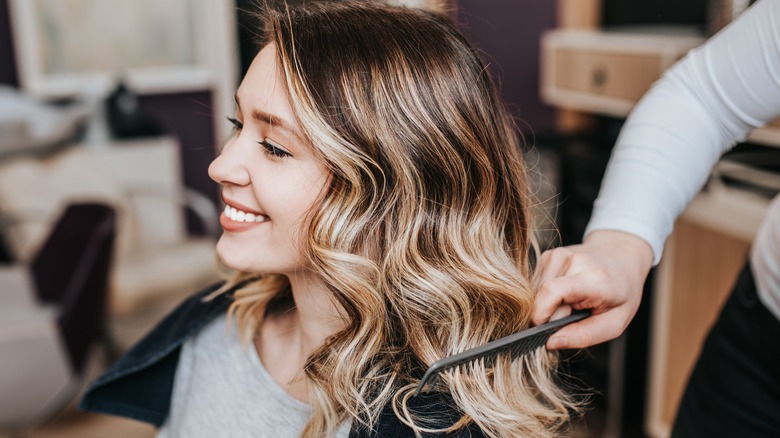 Woman in salon chair