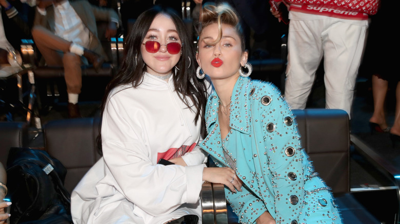 Noah and Miley Cyrus attending VMAs