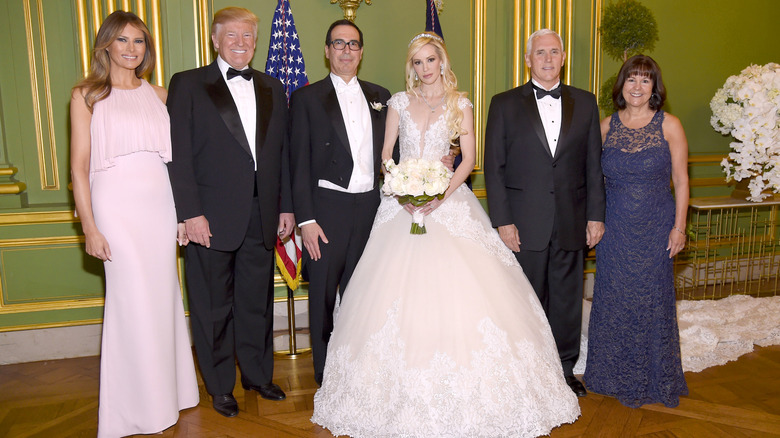 Melania and Donald Trump at a wedding in 2017
