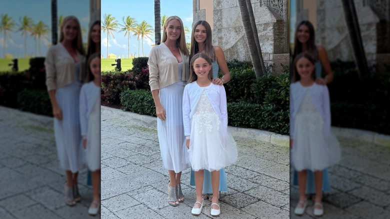 Vanessa Trump with her daughters posing in formal wear