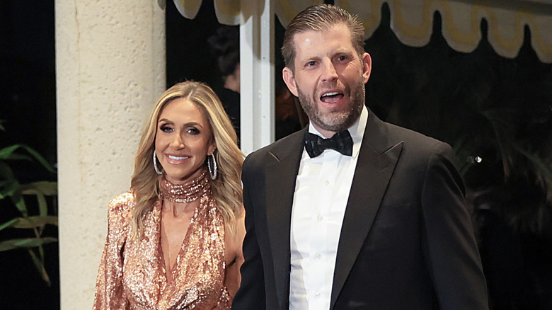 Lara Trump copper sequin dress with Eric Trump entering event