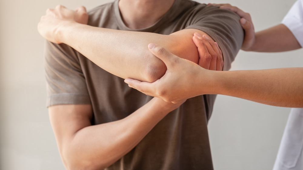 Man receiving an acupressure treatment