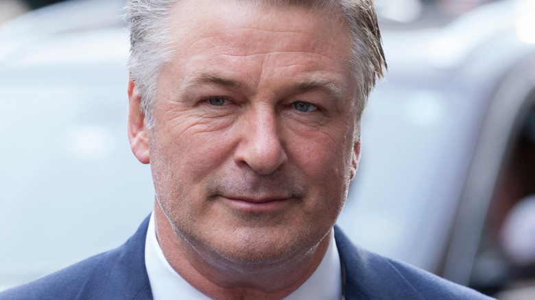 Alec Baldwin slight grin