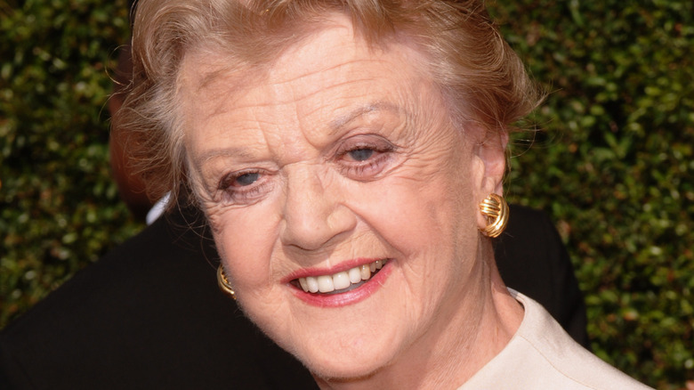 Angela Lansbury smiling outdoors