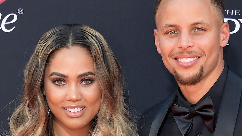 Ayesha Curry and Stephen Curry smile