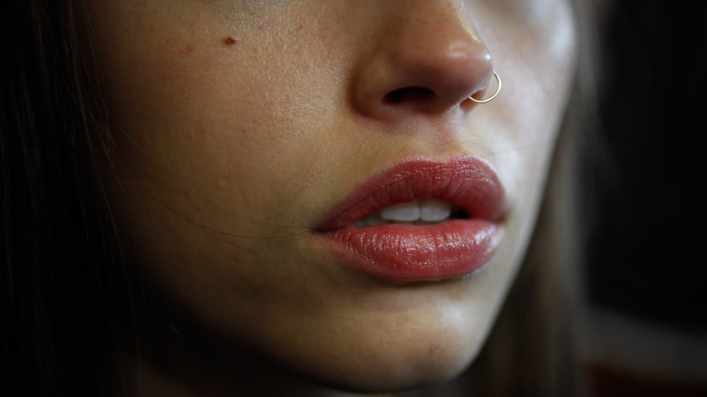 Woman beauty mark cheek