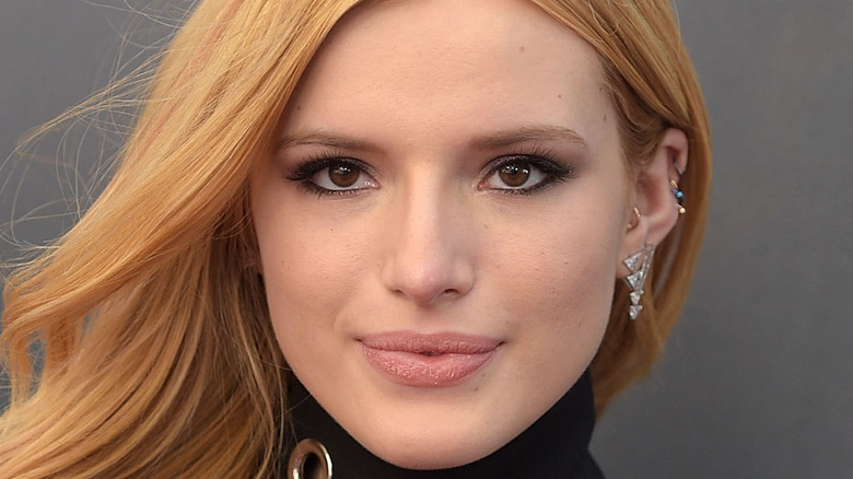 Bella Thorne poses on the red carpet