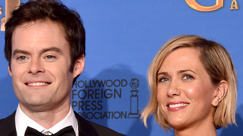 Actors Bill Hader and Kristen Wiig on red carpet