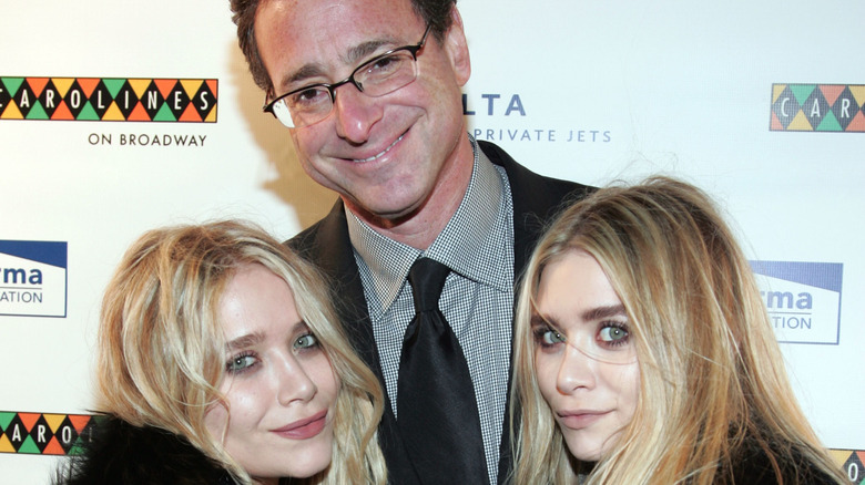 Bob Saget with the Olsen twins posing