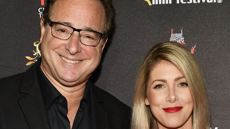 Bob Saget and Kelly Rizzo photographed at an event