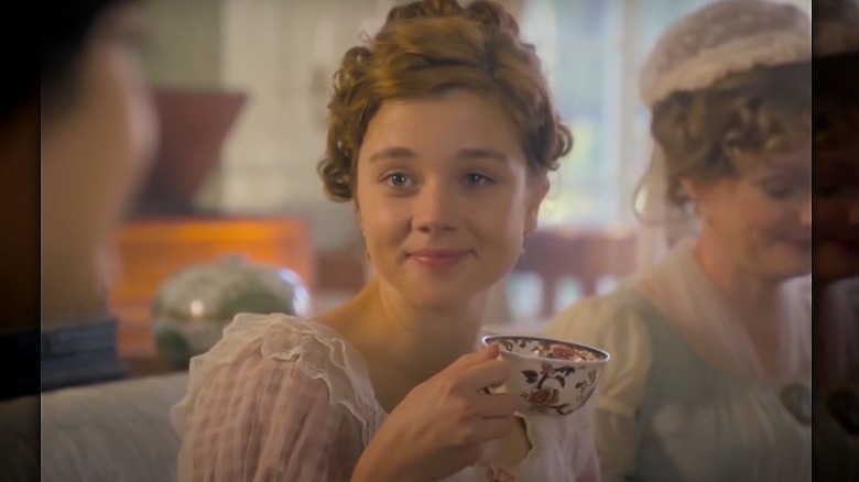 Claudia Jessie smiling in Vanity Fair