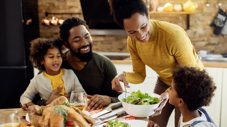 Family eating Thanksgiving dinner