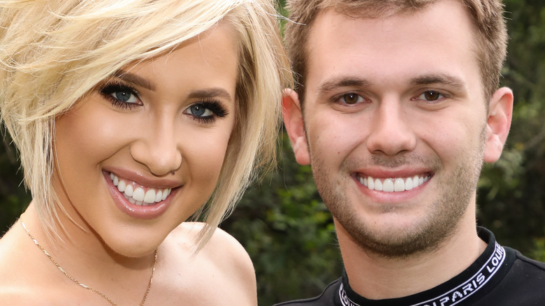 Chase and Savannah Chrisley smile