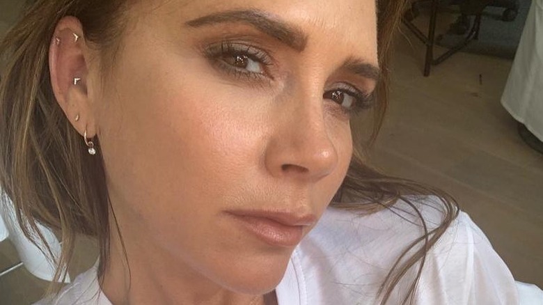 Victoria Beckham with conch piercing