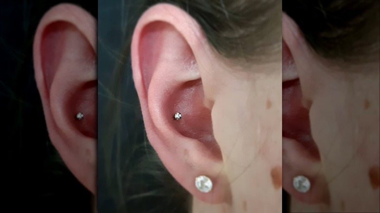 I've had my conch pierced for close to 14 years but whenever I put a hoop  in it gets sore after sleeping. This is the aesthetic I want. Does this  happen to