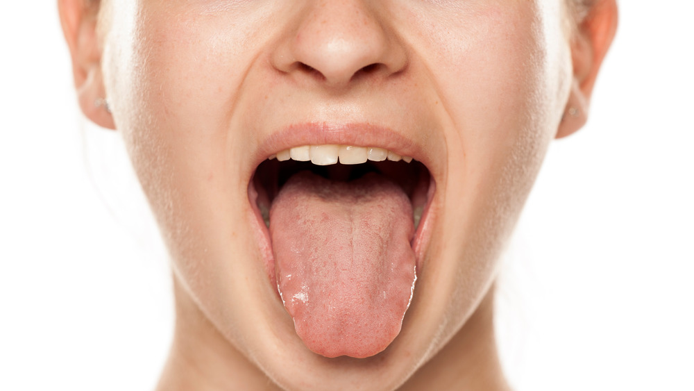 Woman sticking her tongue out