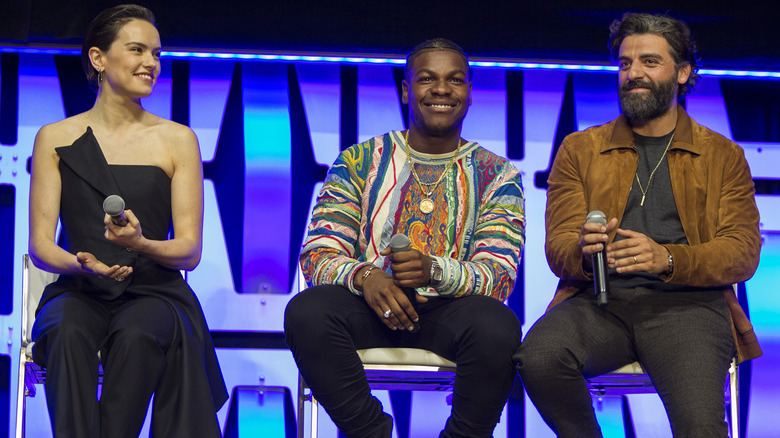 Daisy Ridley, John Boyega, and Oscar Isaacs