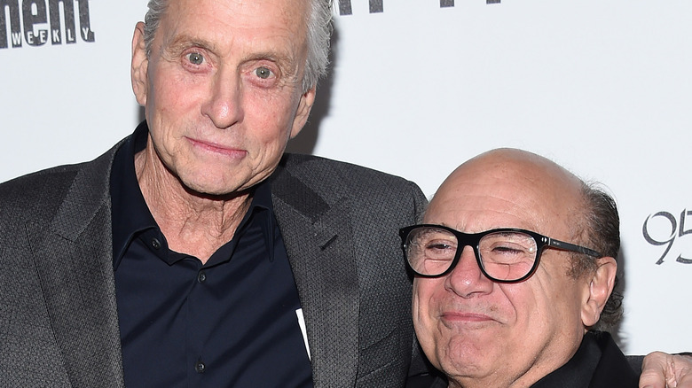 Close pals Michael Douglas and Danny DeVito pose together on the red carpet