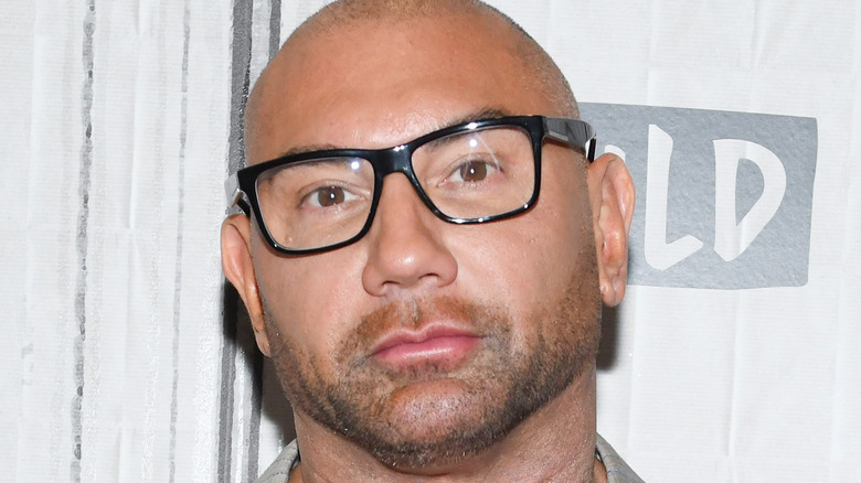 Dave Bautista poses on the red carpet